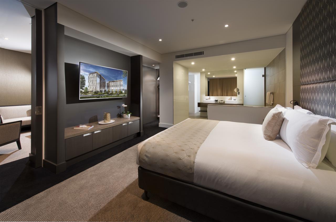 Pullman Brisbane Airport Hotell Exteriör bild A bedroom at the hotel